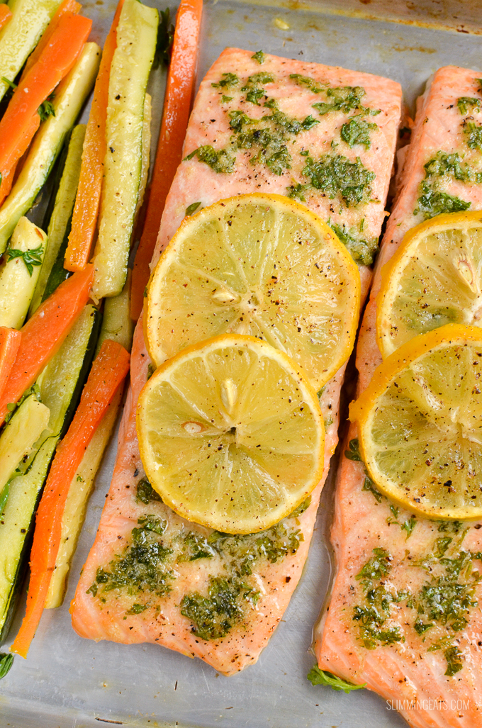Simple Delicious Lemon and Herb Butter Salmon Traybake - succulent salmon fillets with the flavours of garlic, herbs and butter. Gluten Free, Slimming World and Weight Watchers friendly #slimmingworld #weightwatchers #traybake #salmon