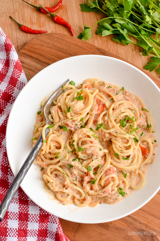 Seafood Lovers reunite for this Spicy Creamy Crab, Chilli and Cherry Tomato Pasta - a true flavour explosion!! Slimming World and Weight Watchers friendly | www.slimmingeats.com