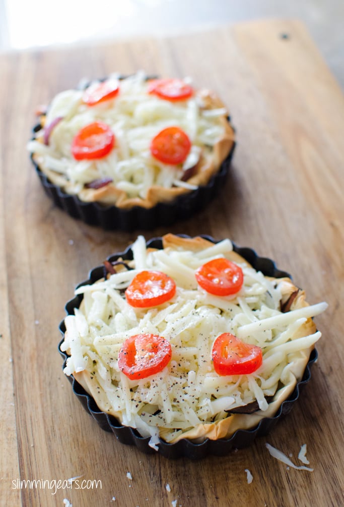 ready for the oven tomato, caramelized onion and mozzarella filo tarts