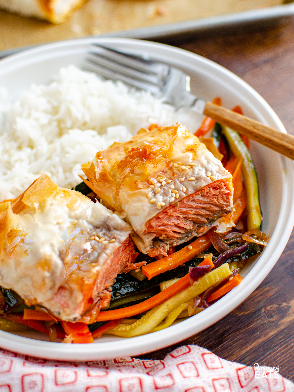 Thai Salmon Filo Parcel in bowl with rice and vegetables