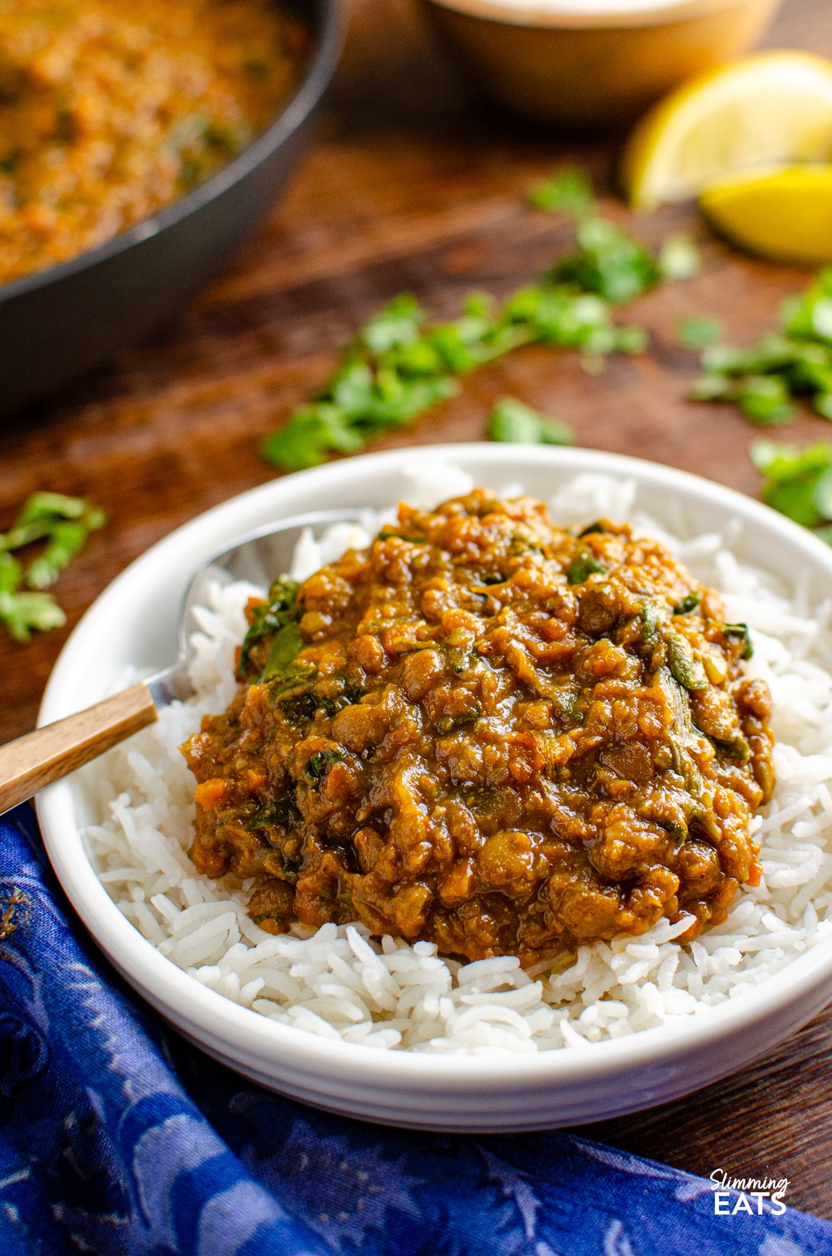 Delicious Spicy Lentils and Spinach - a perfect meal for Meatless Mondays! Even non-vegetarians will love this recipe. Lentils are not only affordable but also a fantastic source of protein and fiber. I always keep different varieties in my pantry; red lentils for soups and daal, and chunkier lentils like brown or green lentils as a substitute for ground meat in recipes.