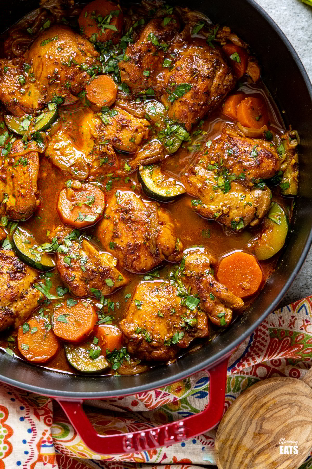 Moroccan Chicken Casserole - Delicious hearty and wholesome casserole with the lovely flavours of Moroccan inspired spices. Moroccan Casserole in cherry cast iron staub dish