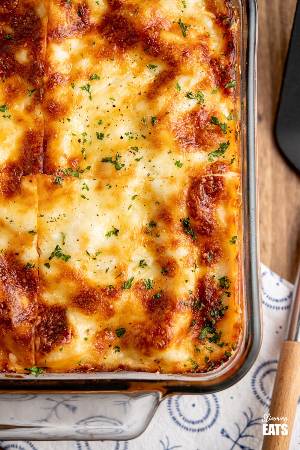 close up of lasagne in pyrex dish