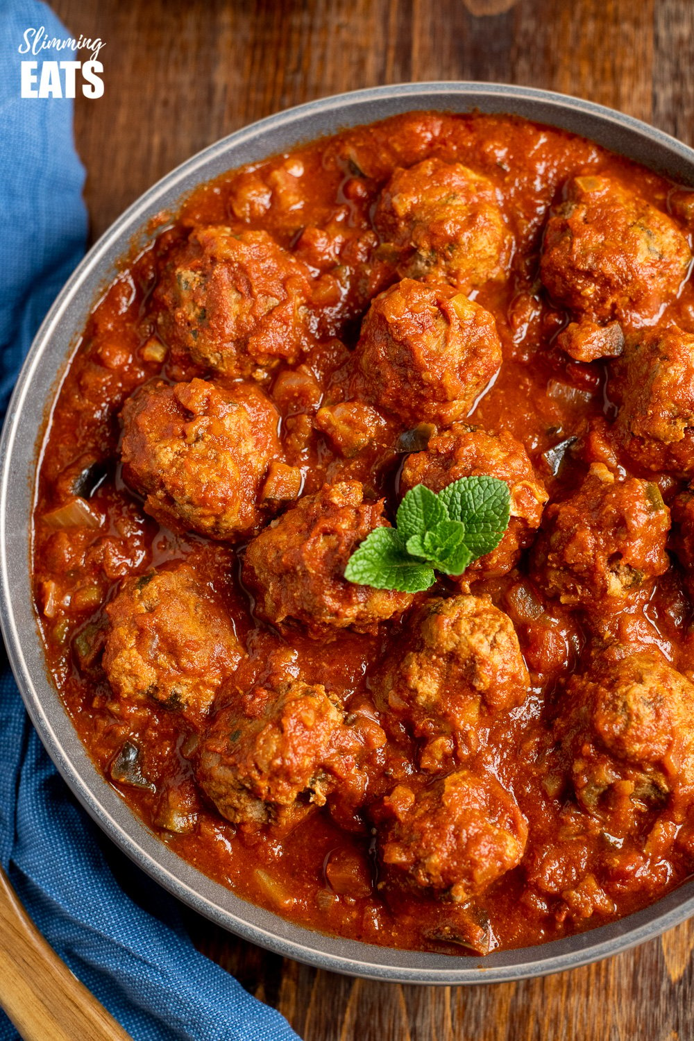 close up of lamb and mint meatballs in a sweet and spicy sauce