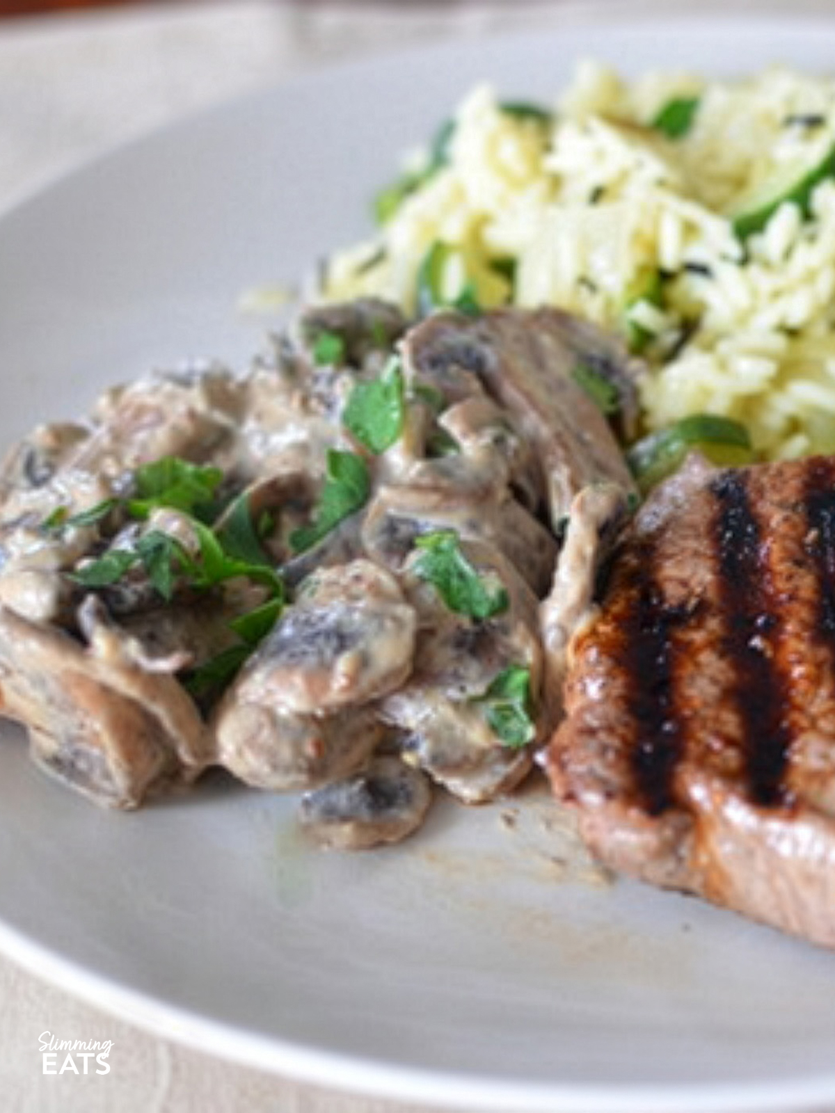 Fillet Steak with Creamy Garlic Mushrooms and Courgette Wild Rice Pilaf