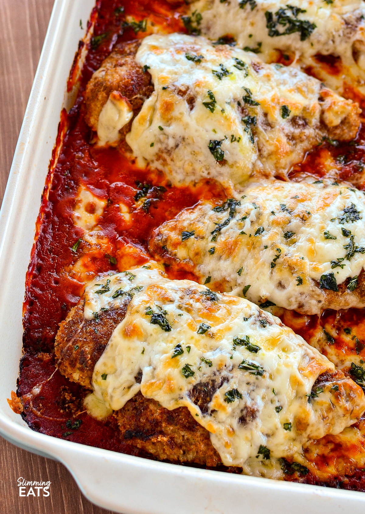 close up of Chicken Parmesan in le creuset oven baking dish