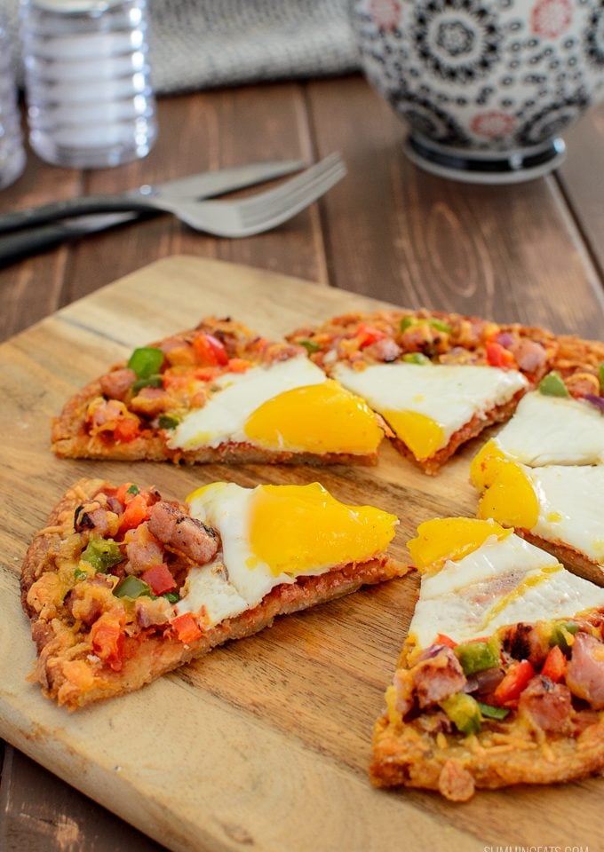 sliced breakfast hash brown pizza with coffee and knife and fork picture 2