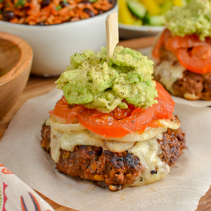 The Ultimate Slimming Eats Mexican Burgers - tender juicy burger stacks, topped with melted cheese, caramelized onions, ripe tomatoes and mashed avocado. Gluten-Free, Slimming Eats and Weight Watchers friendly | www.slimmingeats.com