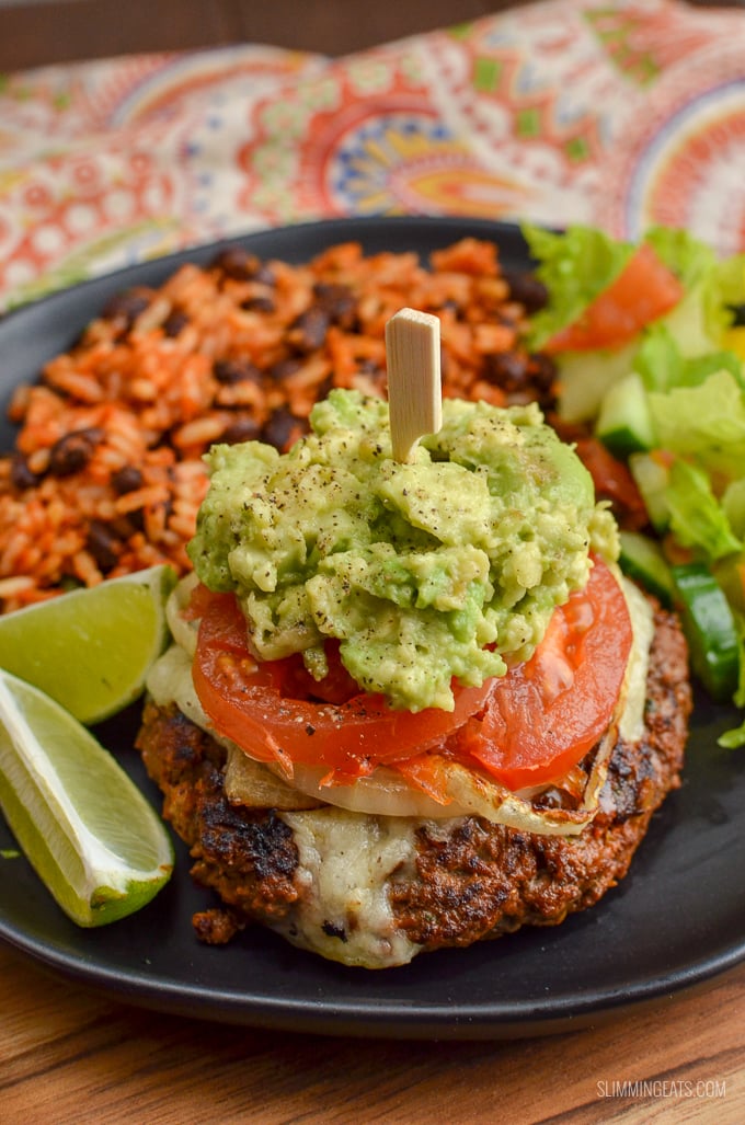 The Ultimate Slimming Eats Mexican Burgers - tender juicy burger stacks, topped with melted cheese, caramelized onions, ripe tomatoes and mashed avocado. Gluten-Free, Slimming Eats and Weight Watchers friendly | www.slimmingeats.com