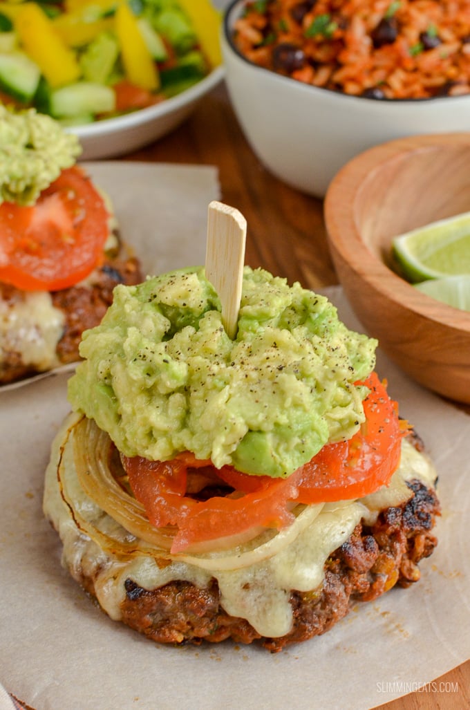 The Ultimate Slimming Eats Mexican Burgers - tender juicy burger stacks, topped with melted cheese, caramelized onions, ripe tomatoes and mashed avocado. Gluten-Free, Slimming Eats and Weight Watchers friendly | www.slimmingeats.com