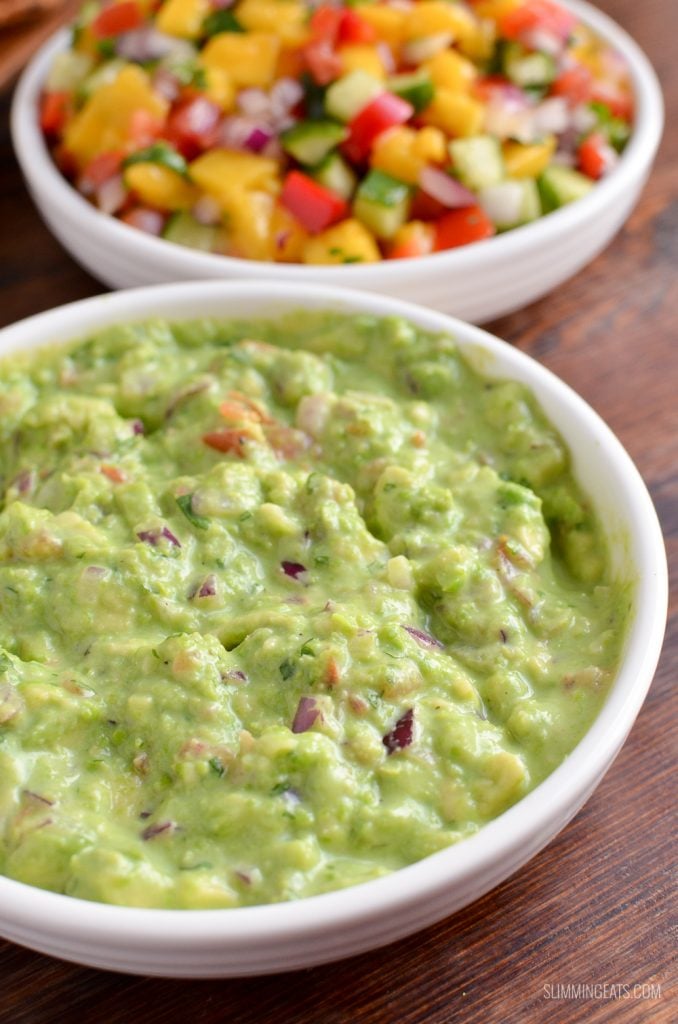 guacamole in white dish with Mango salad