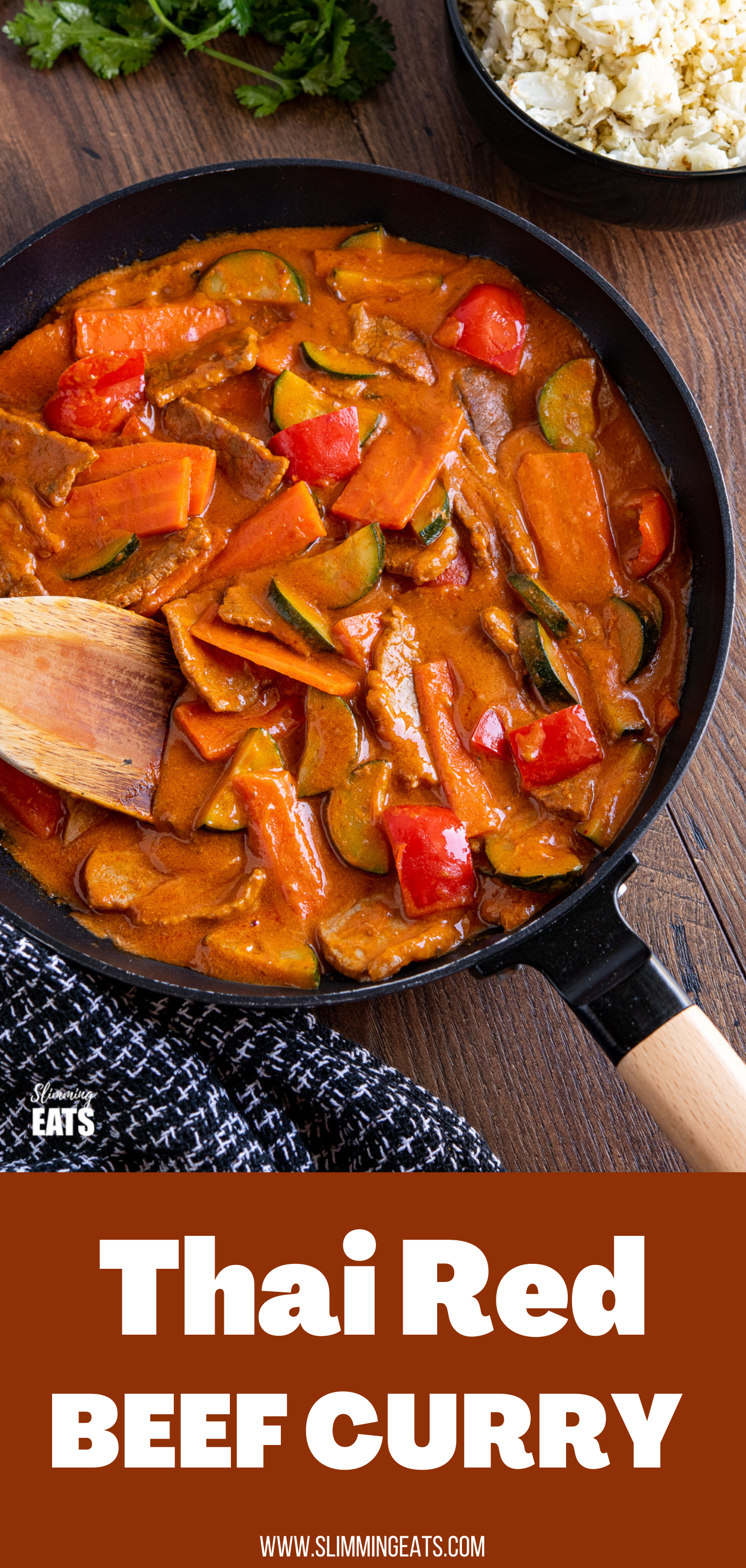 thai red curry in black frying pan with wooden handle, bowl of cauliflower rice in background pin image