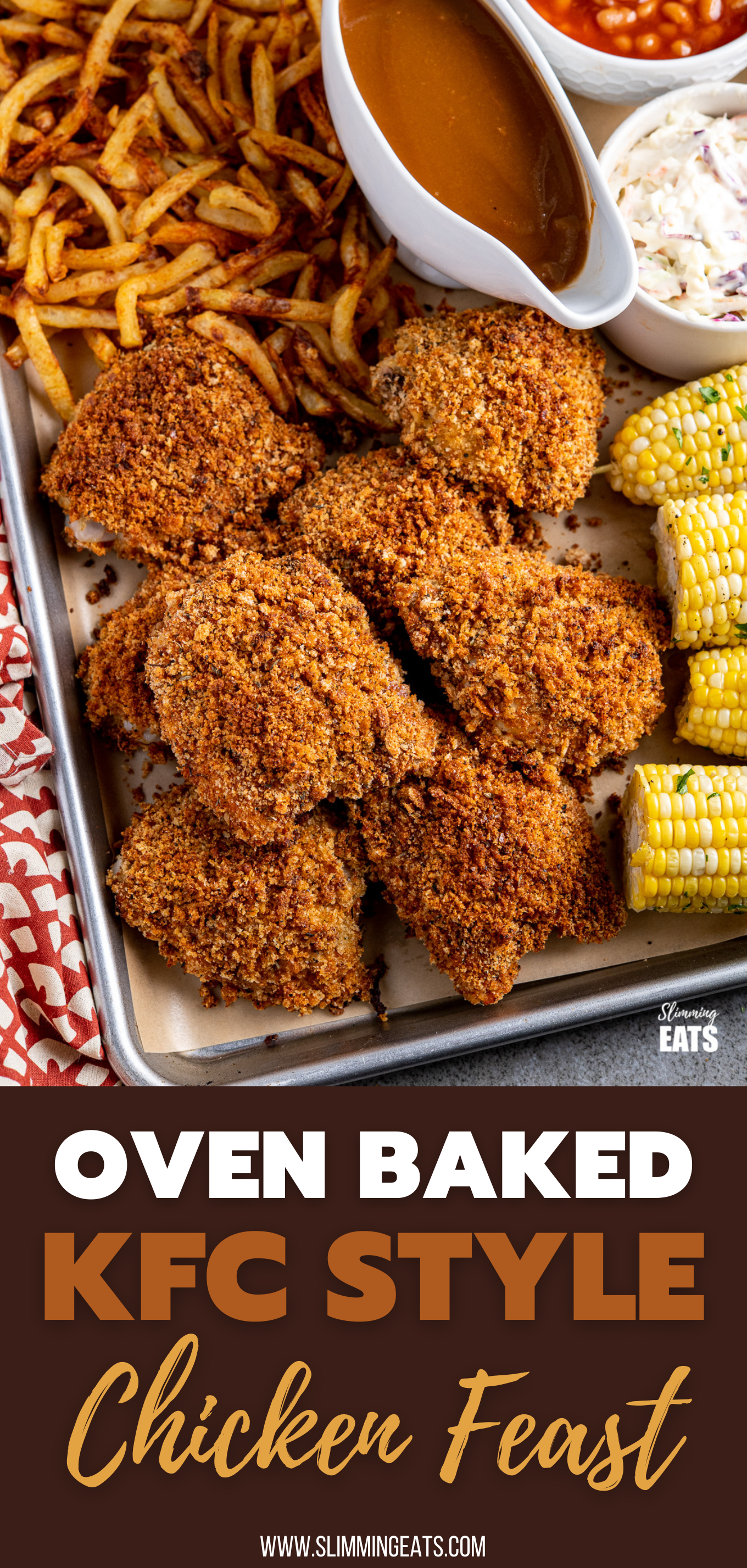 kfc chicken on parchment lined baking tray with sides (fries, beans, coleslaw and corn)