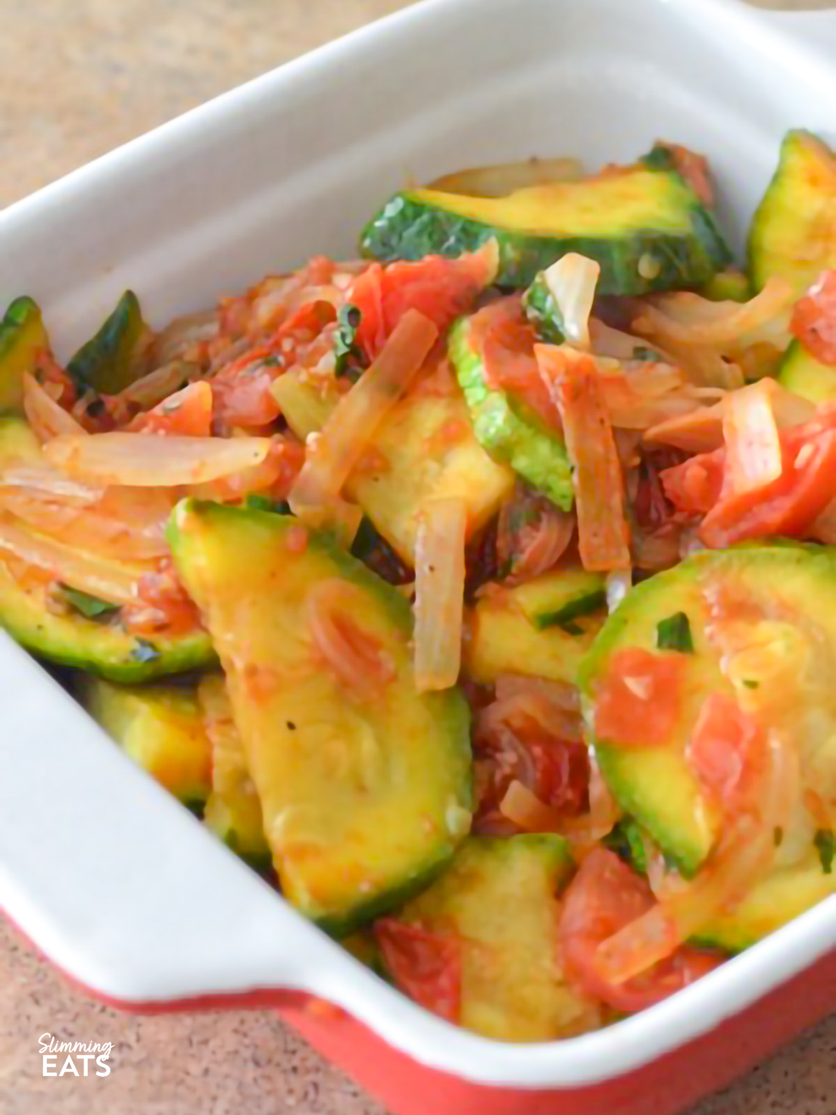Mayan Heirloom Squash with Tomatoes and Basil in a ceramic dish