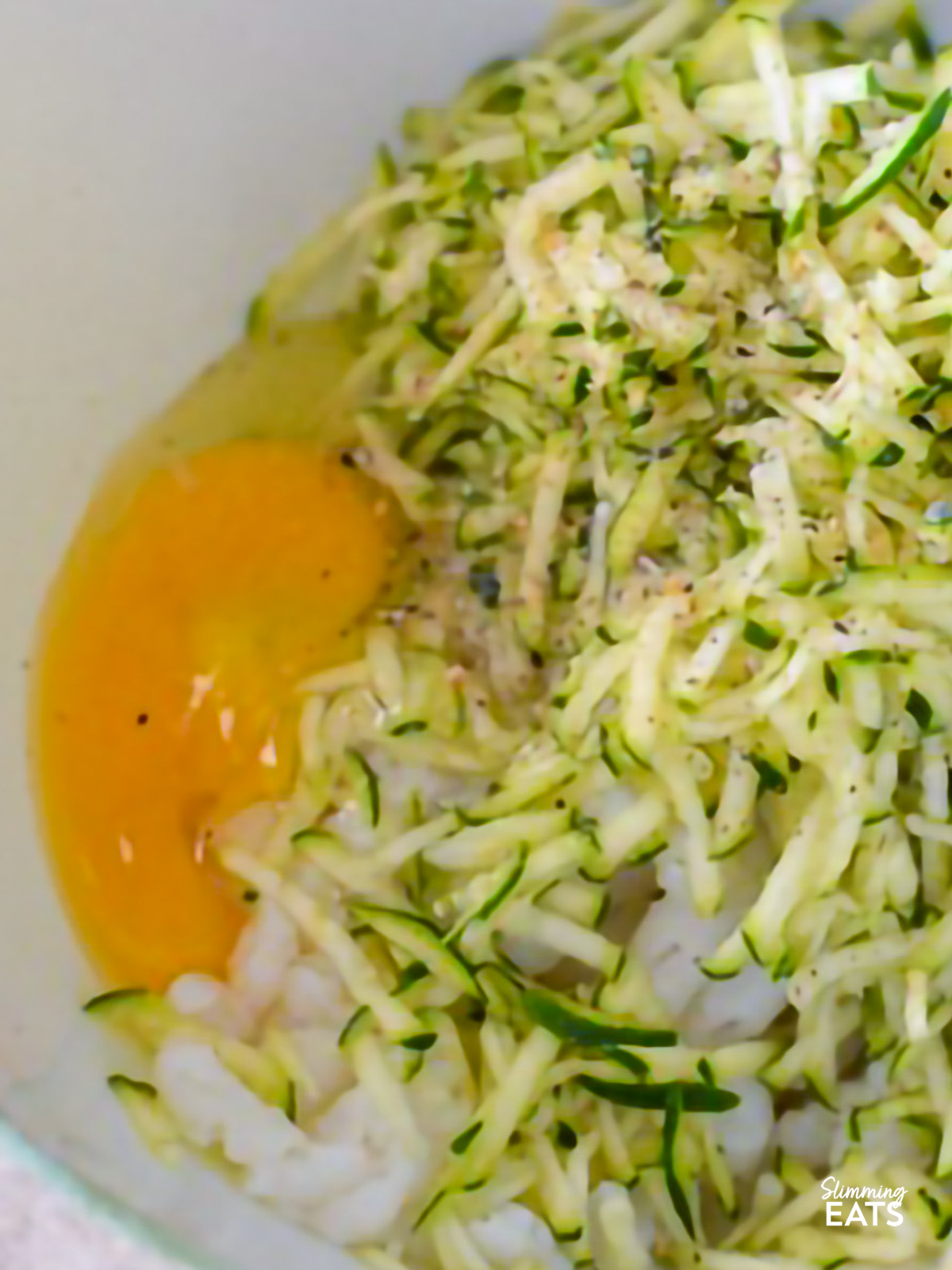 ingredients for Rustic Courgette and Potato Cakes in a bowl