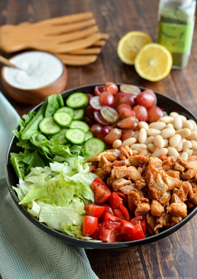 tuscan chicken salad, chopped in black bowl