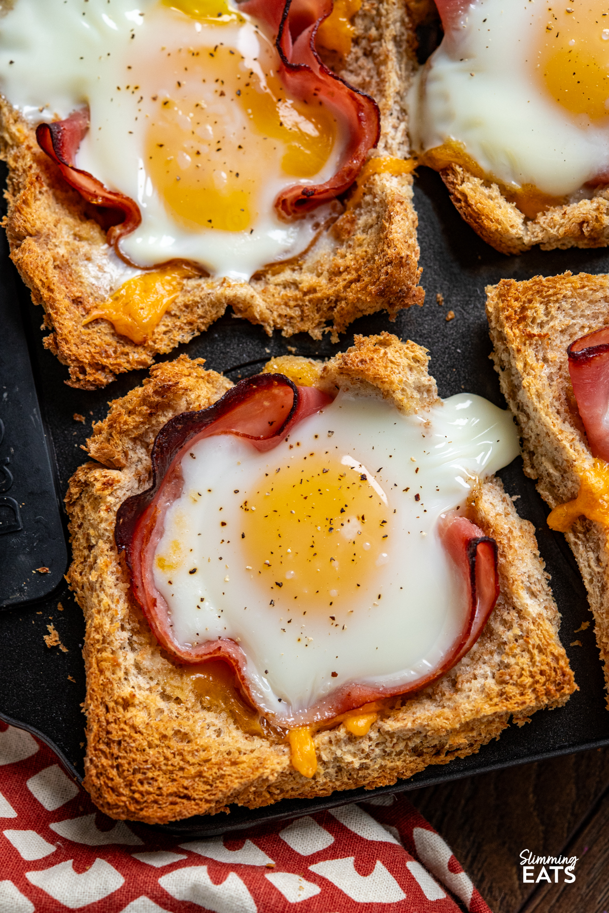 Egg, Ham and Cheese Toast Baskets in muffin tray