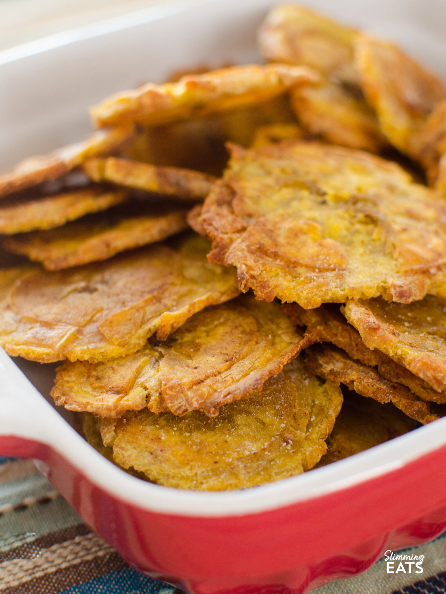 Baked Tostones in a red dish