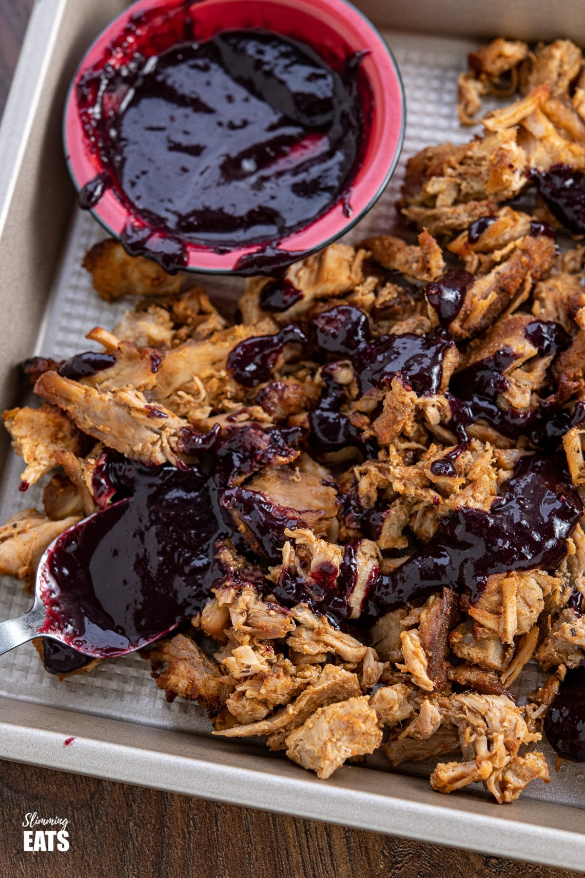 Pulled Pork with Blueberry BBQ sauce with drizzled blueberry bbq sauce