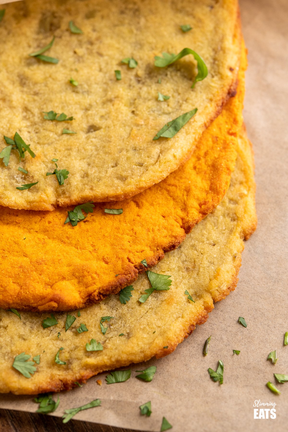 close up of sweet potato flatbread on parchment