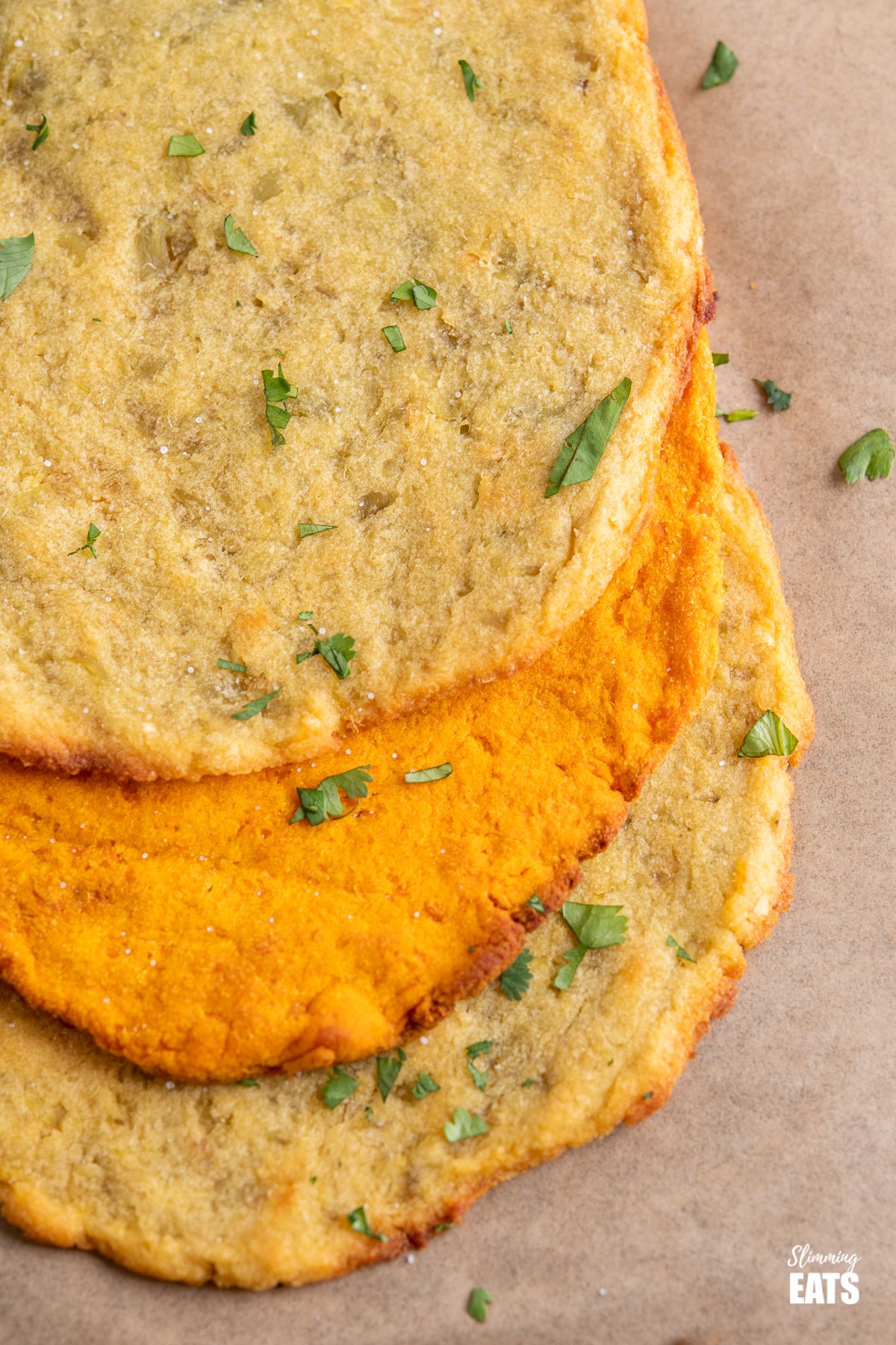 close up of sweet potato flatbread on parchment paper