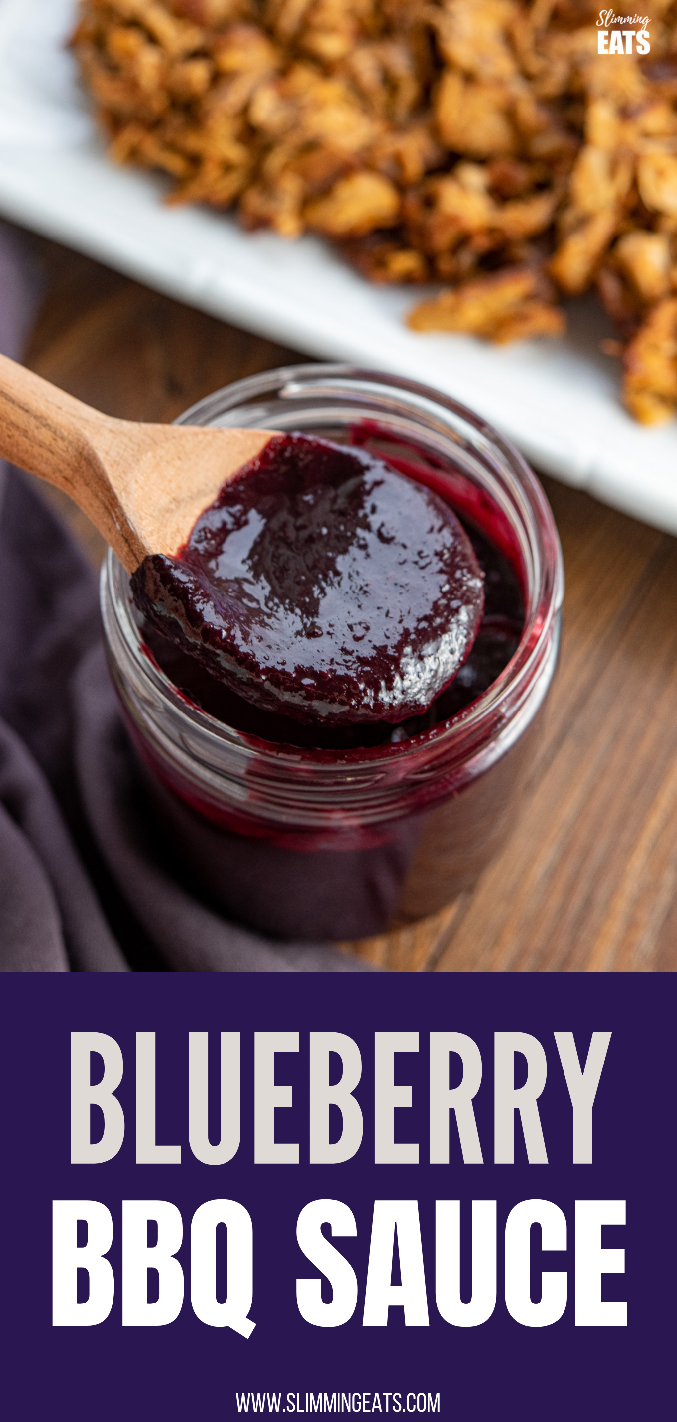 wooden spoon spooning blueberry bbq sauce from a jar 