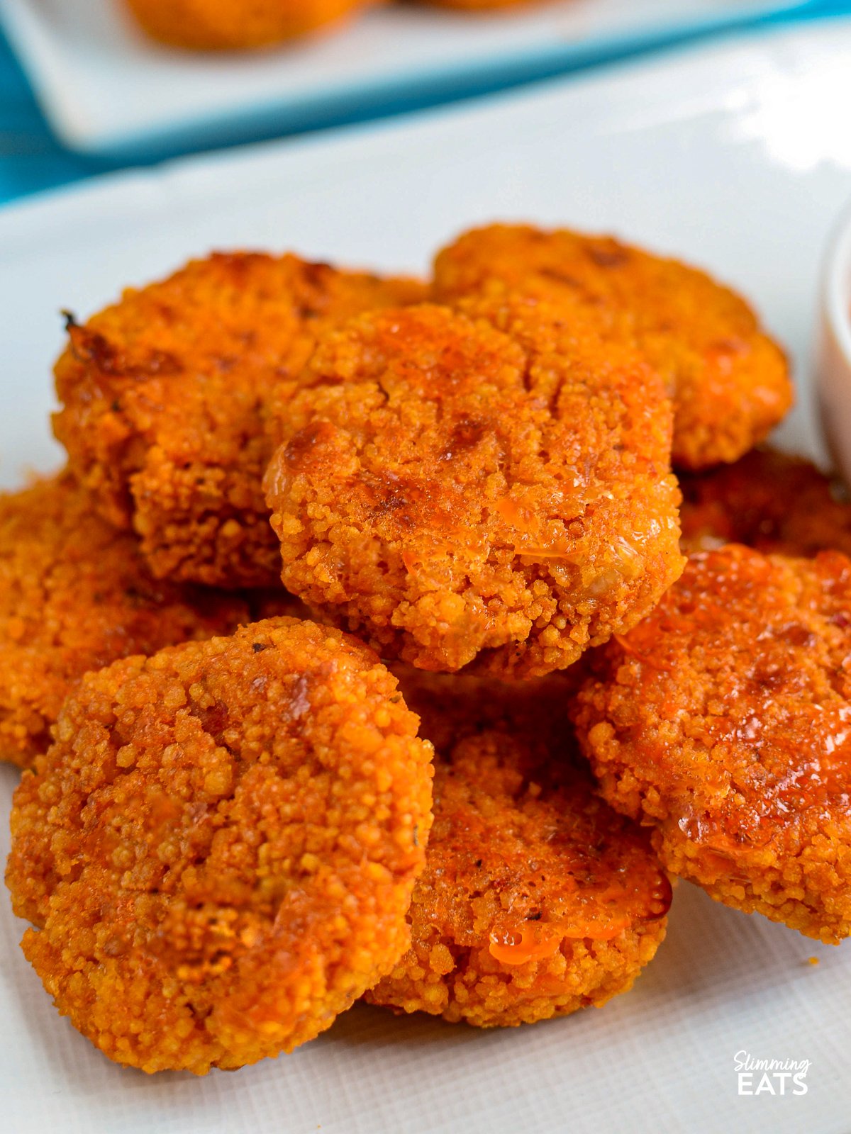 close up Cheesy Couscous Bites with Tomato Dip