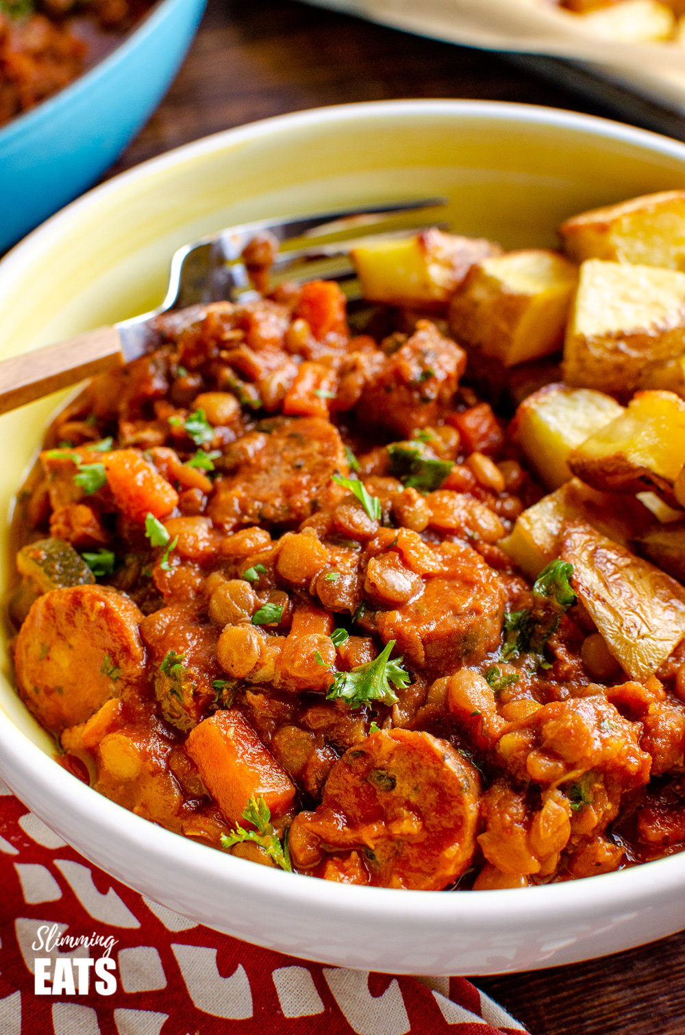 close up of. One Pot Sausage and Lentil Casserole in yellow and white bowl