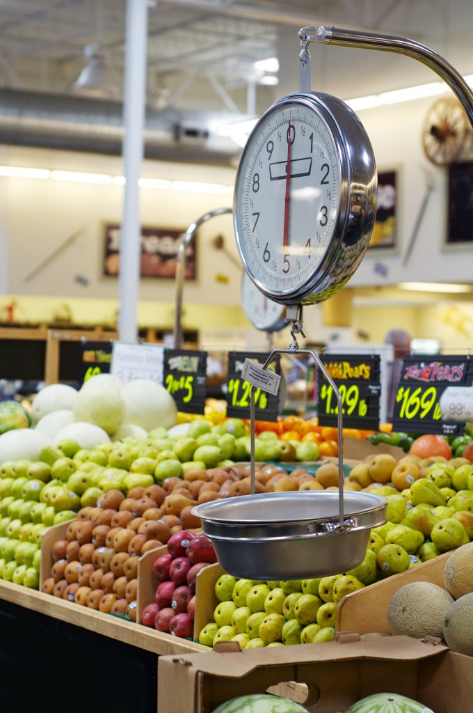 fresh fruit and veg at supermarket with produce scales