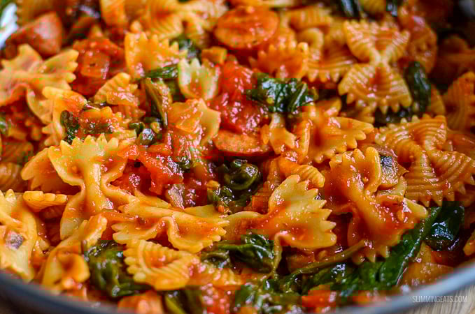 Serve pasta for dinner with the delicious flavours in this super quick Sausage, Tomato and Spinach Pasta - a perfect family meal. - Gluten free, dairy free, vegetarian, Slimming Eats and Weight Watchers friendly