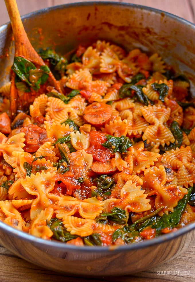 Serve pasta for dinner with the delicious flavours in this super quick Sausage, Tomato and Spinach Pasta -  a perfect family meal. - Gluten free, dairy free, vegetarian, Slimming Eats and Weight Watchers friendly