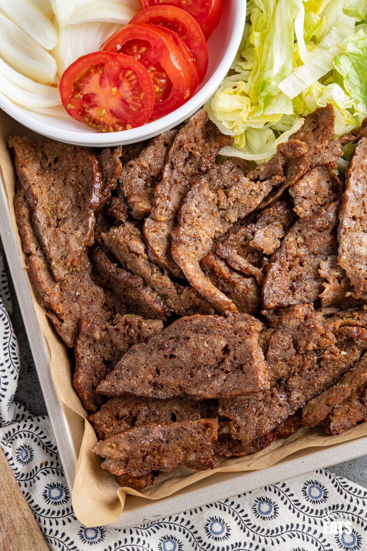 close up of doner kebab meat on baking tray