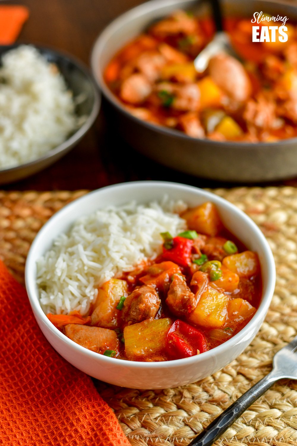 instant pot sweet and sour chicken in white bowl with white rice