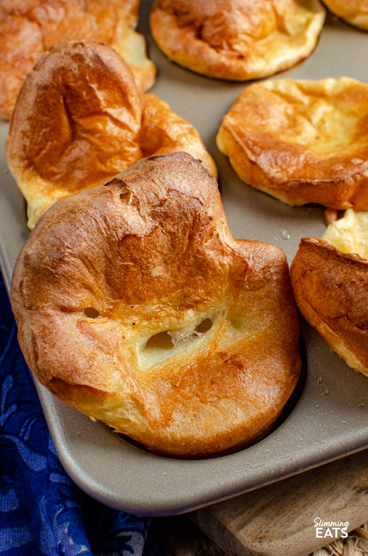 close up of yorkshire puddings cooked in a muffin tray