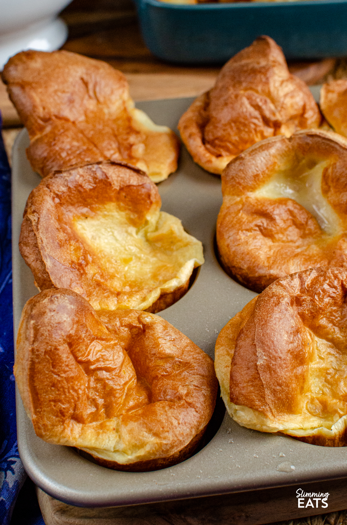 close up of yorkshire puddings cooked in a muffin tray 