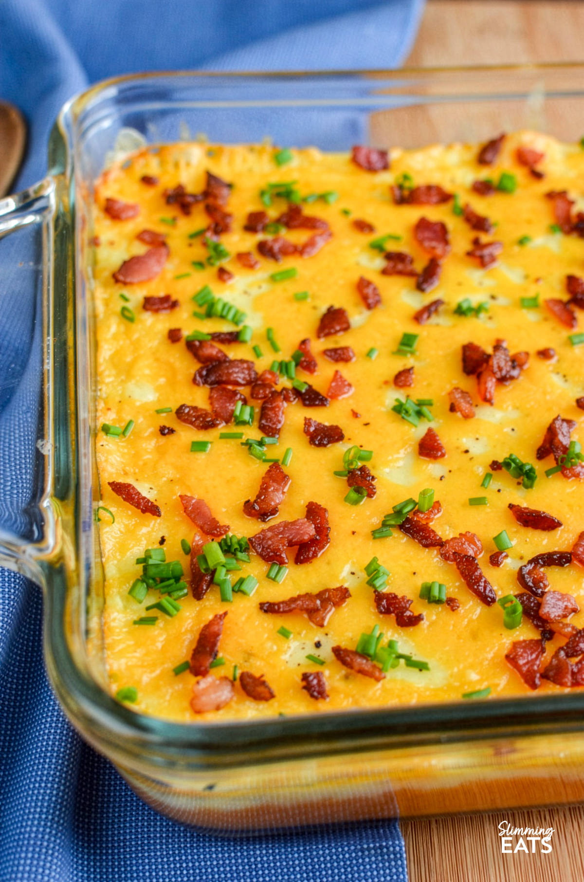 layered mashed potato casserole in a glass oven dish