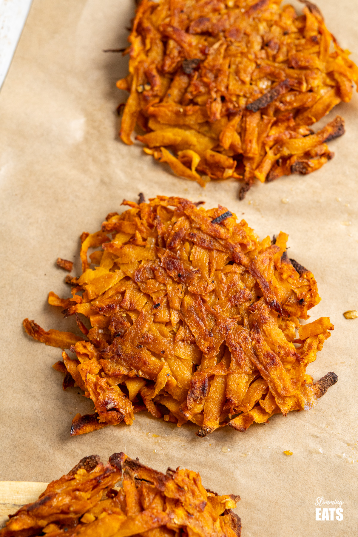 close up of sweet potato hash brown on tray