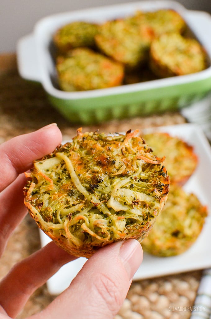 Broccoli Cheddar Hash Brown Muffins  being picked up from white plate