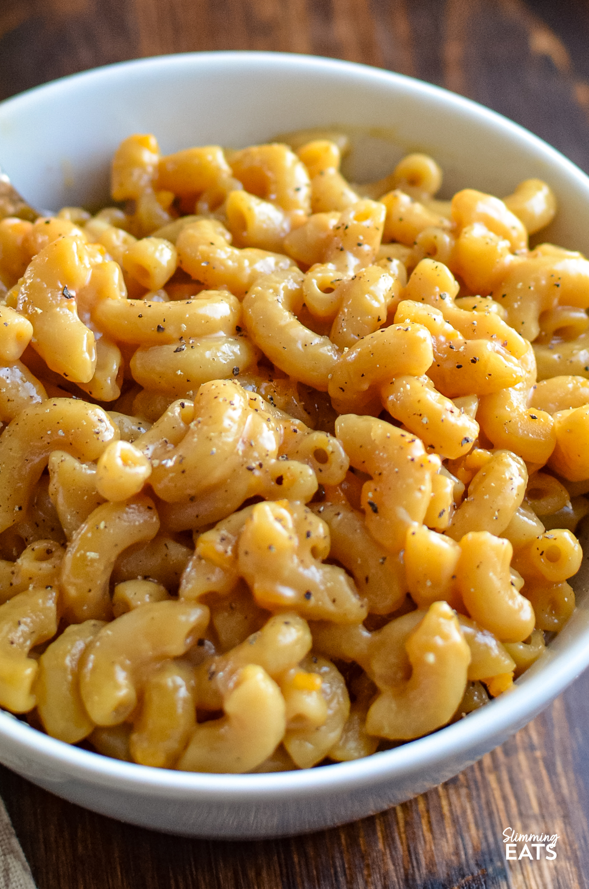 close up of marmite mac and cheese serving in a white bowl