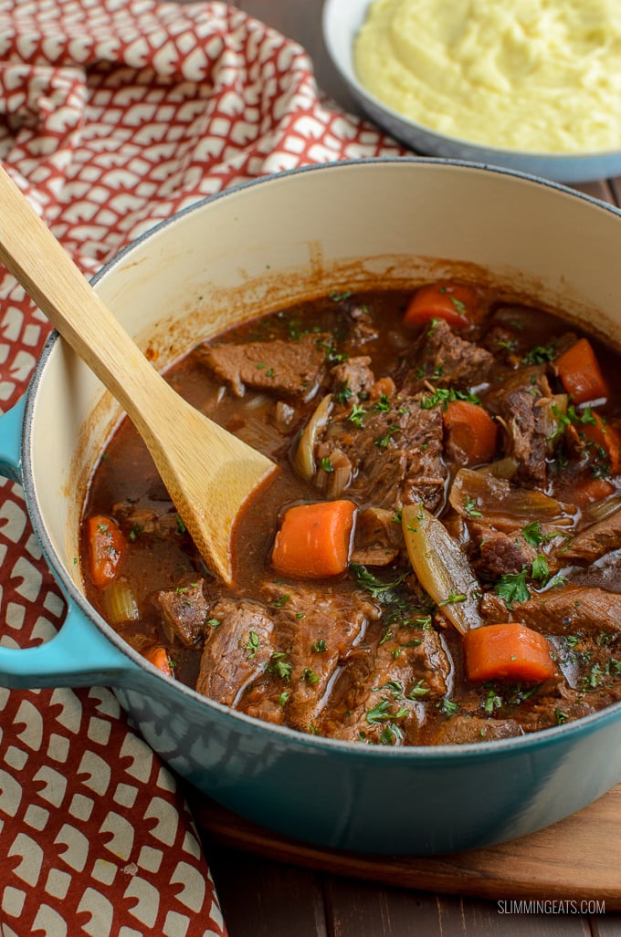 Melt in your mouth Slow Cooker Guinness Beef Brisket - a delicious rich hearty dish that is pure comfort in a bowl. Dairy Free, Slimming Eats and Weight Watchers friendly | www.slimmingeats.com