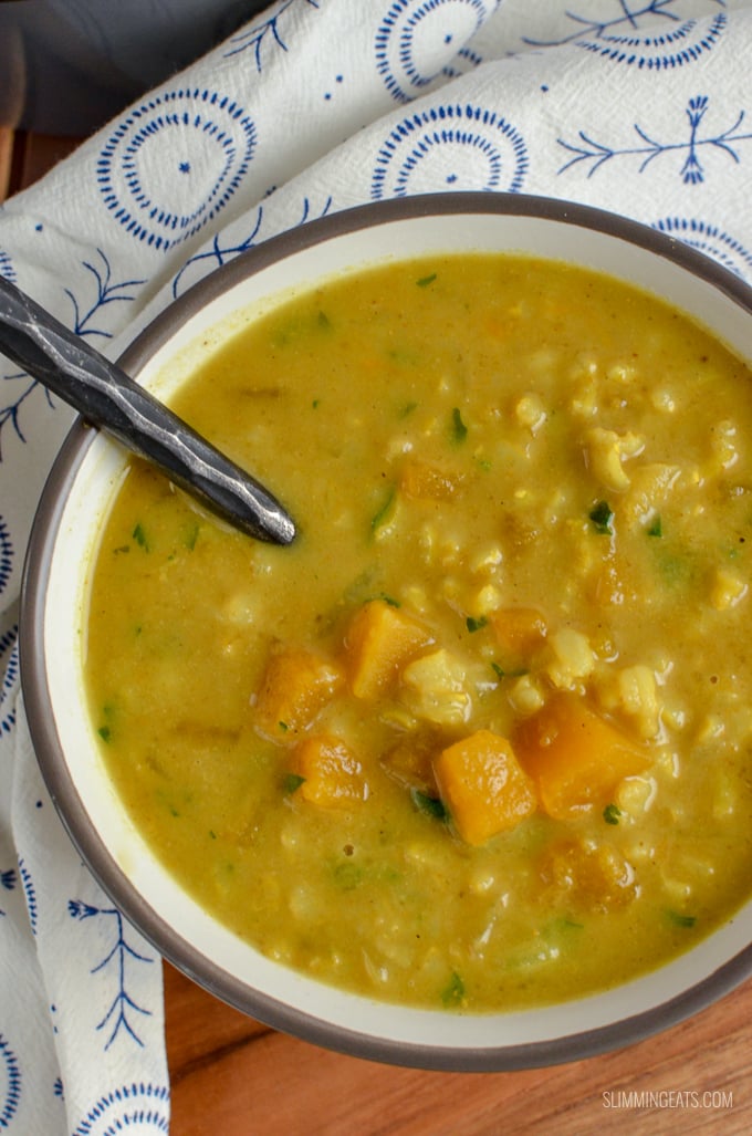 Curried Butternut Squash and Brown Rice Soup - a perfect recipe to warm yourself up on a cold winters day. Gluten Free, Dairy Free, Vegan, Instant Pot, Slimming World and Weight Watchers friendly | www.slimmingeats.com