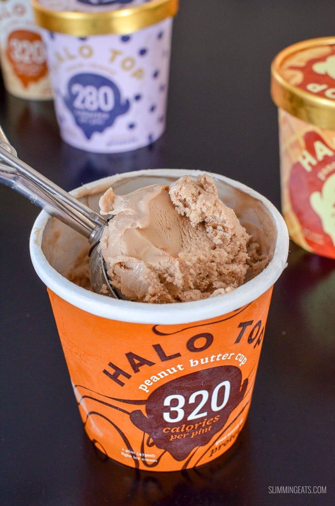 spoon scooping out icecream from halo top peanut butter cup tub