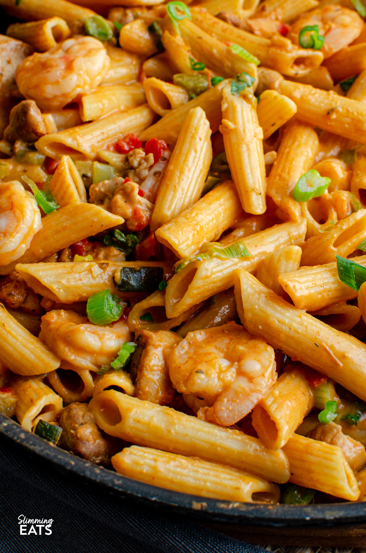 close up New Orleans Cajun Pasta in black frying pan