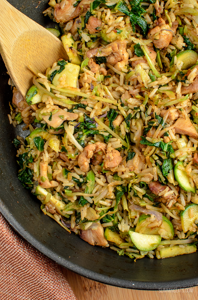  A fragrant delicious twist in this delicious Orange Ginger Chicken Fried Rice - a complete meal in a bowl. Gluten Free, Dairy Free, Slimming Eats and Weight Watchers friendly.  CALORIES: 223 | WEIGHT WATCHERS SMART POINTS: 4 | www.slimmingeats.com