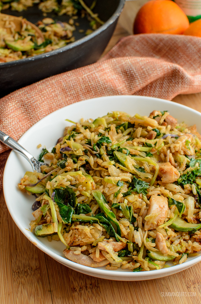  A fragrant delicious twist in this delicious Orange Ginger Chicken Fried Rice - a complete meal in a bowl. Gluten Free, Dairy Free, Slimming Eats and Weight Watchers friendly.  CALORIES: 223 | WEIGHT WATCHERS SMART POINTS: 4 | www.slimmingeats.com