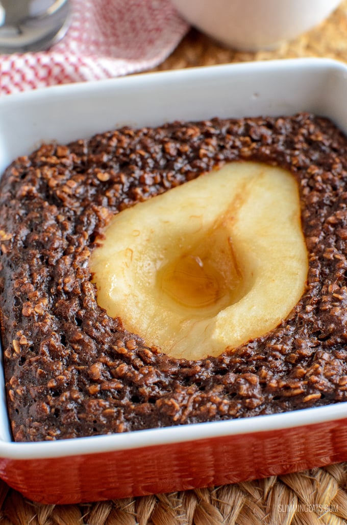 Delicious and totally indulgent Rich Chocolate and Pear Baked Oats to enjoy for breakfast or dessert.  Gluten Free, Vegetarian, Slimming World and Weight Watchers friendly | www.slimmingeats.com