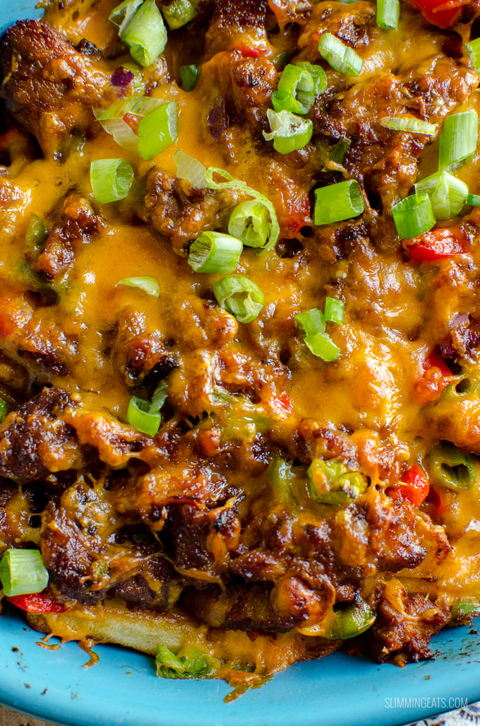 Make the ultimate sharing dish with these Amazing Pulled Pork Loaded Fries - a perfect recipe for leftover Pulled Pork. Gluten Free, Slimming World and Weight Watchers friendly | www.slimmingeats.com