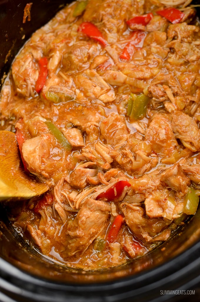 Delicious Slow Cooker Pineapple Pork with the sweetness of crushed pineapple, spicy kick of sambal oelek, plus soy sauce, and red and green pepper. Perfect with rice or noodles. Gluten Free, Slimming World and Weight Watchers friendly | www.slimmingeats.com #slimmingworld #weightwatchers #slowcooker #crockpot