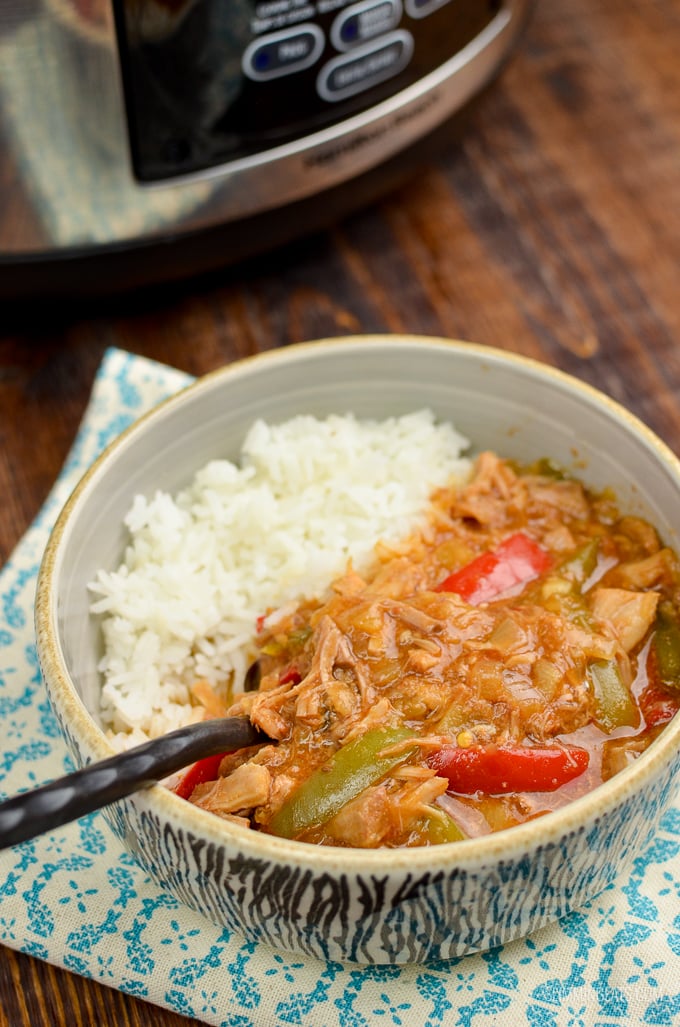 Delicious Slow Cooker Pineapple Pork with the sweetness of crushed pineapple, spicy kick of sambal oelek, plus soy sauce, and red and green pepper. Perfect with rice or noodles. Gluten Free, Slimming Eats and Weight Watchers friendly | www.slimmingeats.com #slimmingeats #weightwatchers #slowcooker #crockpot