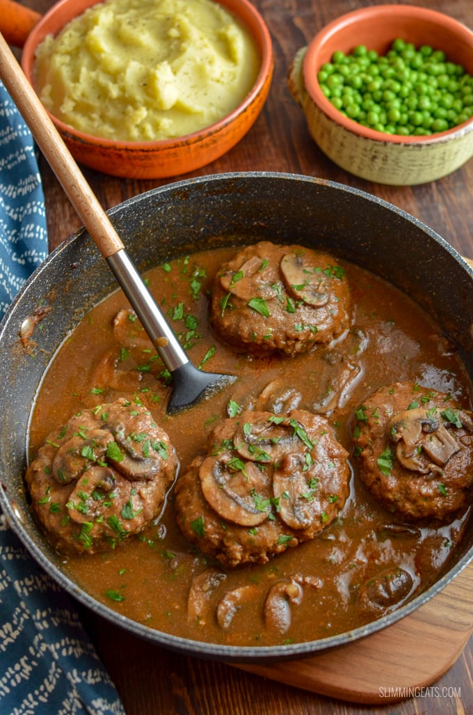 Enjoy a plate of this delicious Salisbury Steak with Gravy - tender beef patties with hidden cauliflower smothered in a delicious rich mushroom onion gravy. Gluten Free, Dairy Free, Paleo, Whole30, Slimming Eats and Weight Watchers friendly | www.slimmingeats.com #slimmingworld #weightwatchers #paleo #beef #3points